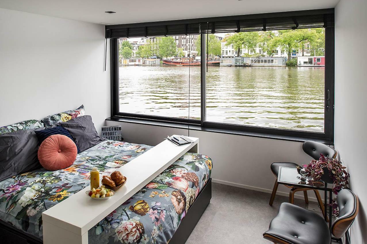 Houseboat Amsterdam - Room With A View Amesterdão Exterior foto