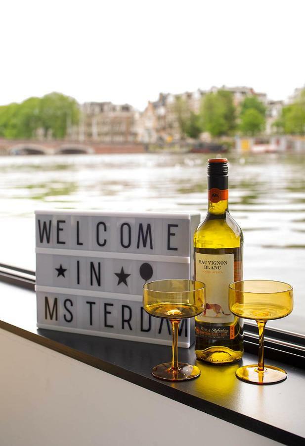 Houseboat Amsterdam - Room With A View Amesterdão Exterior foto